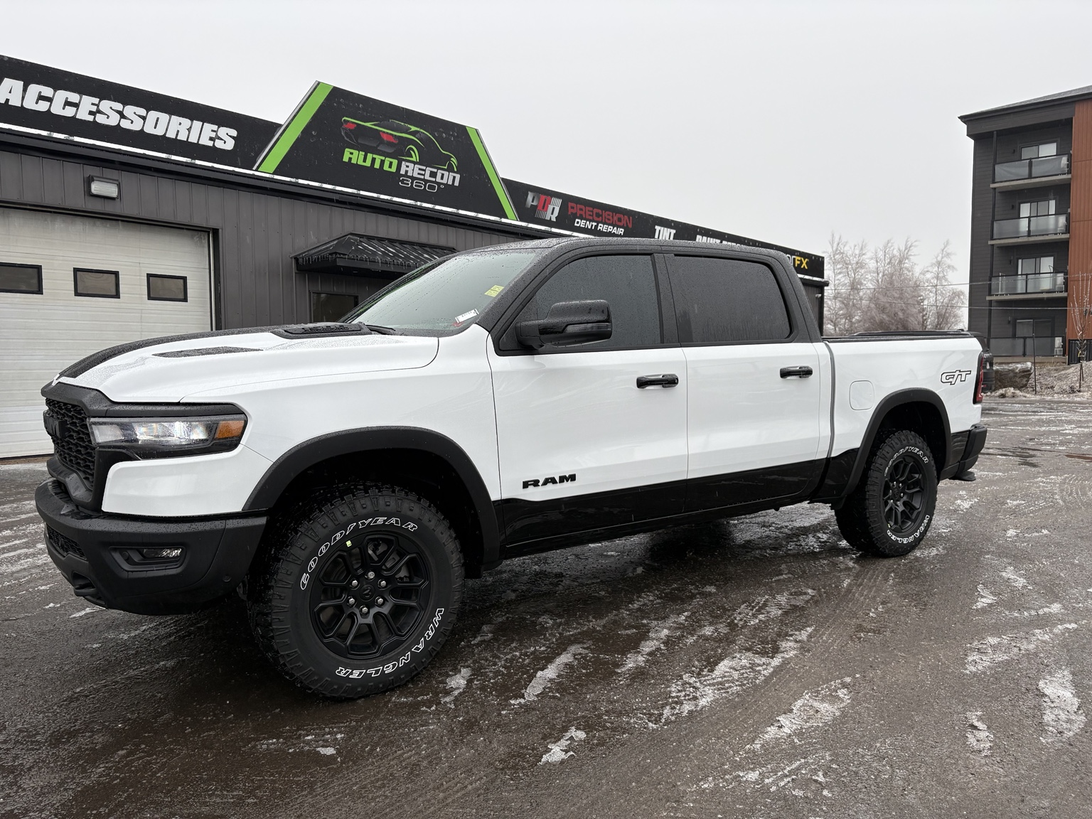 White Ram truck with professionally tinted windows outside AUTO RECON 360 in Moncton